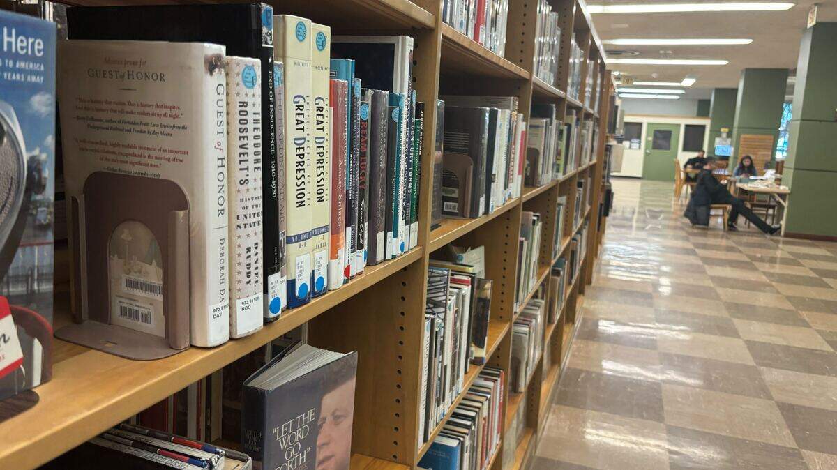 Library-goers read near the stacks at the Fresno County Central Library on Mariposa Street in downtown Fresno on Thursday, Feb. 5, 2026. The proposal to privatize the Fresno County Public Library threatens 115 years of public service and free, safe community spaces.